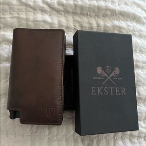 Brand new never used classic brown Ekster wallet.